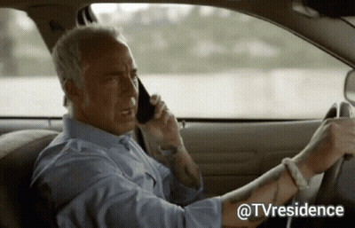 Man Driving Car And Talking On Cell Phone GIF