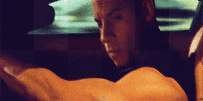 Man Driving Car Arms Outstretched Looking Out Window GIF
