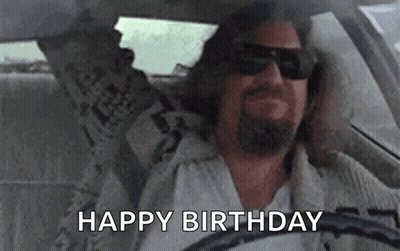 Man Driving Car Holding Newspaper GIF