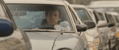 Man Driving Car In Traffic Jam GIF