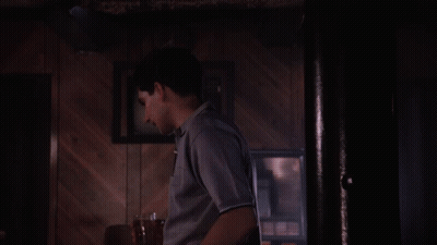 Man Driving Car Looking Out Window GIF
