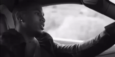 Man Driving Car Looking Out Window GIF