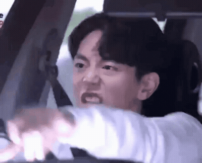Man Driving Car Making Face GIF