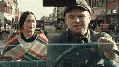 Man Driving Car Next To Woman GIF