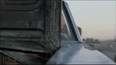 Man Driving Car With Broken Hood GIF