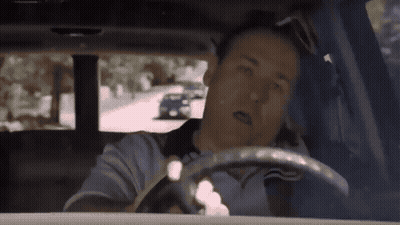 Man Driving Car With Eyes Closed GIF