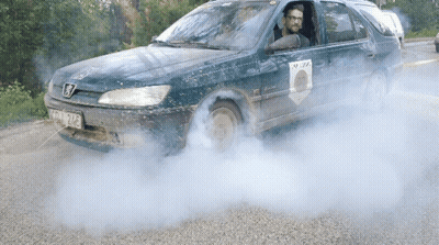 Man Driving Car With License Plate TCW 924 GIF