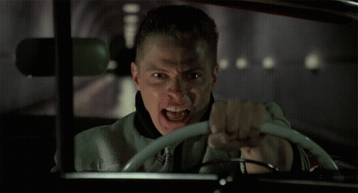 Man Driving Car With Mouth Open GIF