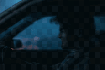 Man Driving Car With Mouth Open GIF