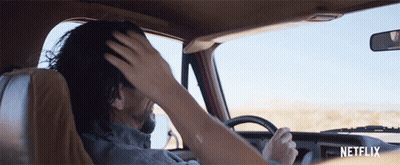 Man Driving Car With Netflix Logo GIF