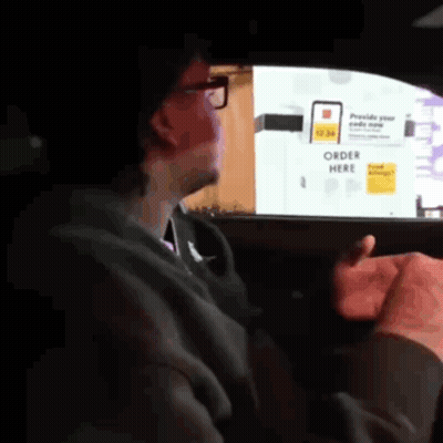 Man Driving Car With Order Here Sign GIF