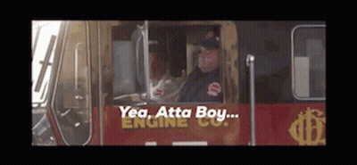 Man Driving Fire Truck Saying Yea Atta Boy GIF