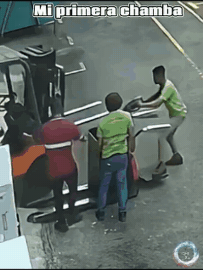 Man Driving Forklift Loading Barrels Into Truck GIF