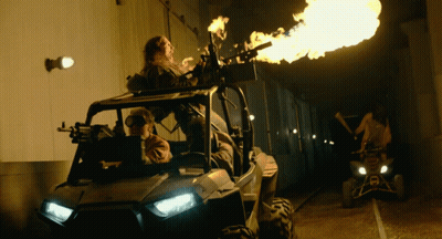 Man Driving Polaris ATV Shooting Flames
