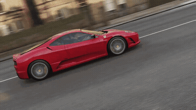 Man Driving Red Toy Car With Duck Face GIF