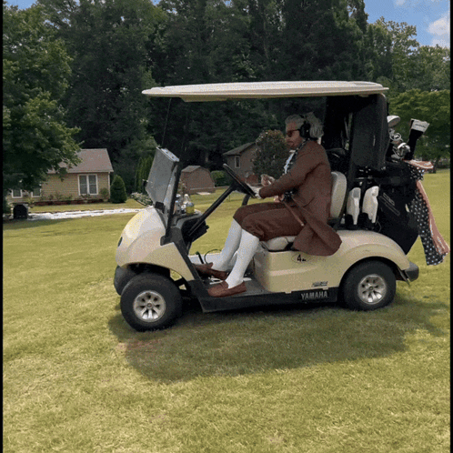 Man Driving Yamaha Golf Cart GIF