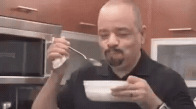 Man Eating Cereal With Spoon GIF