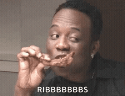 Man Eating Chicken Funny Face Saying Ribs GIF