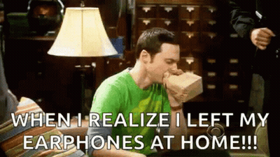 Man Eating Food Bag On Couch With Headphones GIF