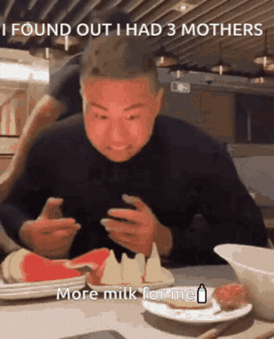 Man Eating Food Looking At Phone Saying I Found Out I Had 3 Mothers GIF