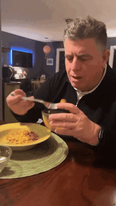 Man Eating Food With Spoon GIF