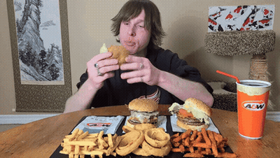 Man Eating Hamburger And Fries At A&W GIF