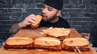 Man Eating Hamburgers And French Fries GIF