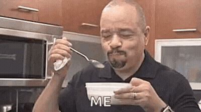 Man Eating Ice Cream From Bowl In Kitchen GIF