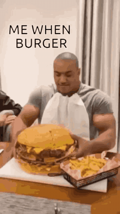 Man Eating Large Hamburger GIF