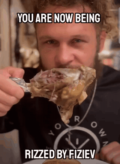 Man Eating Meat Saying You Are Now Being Rizzled GIF