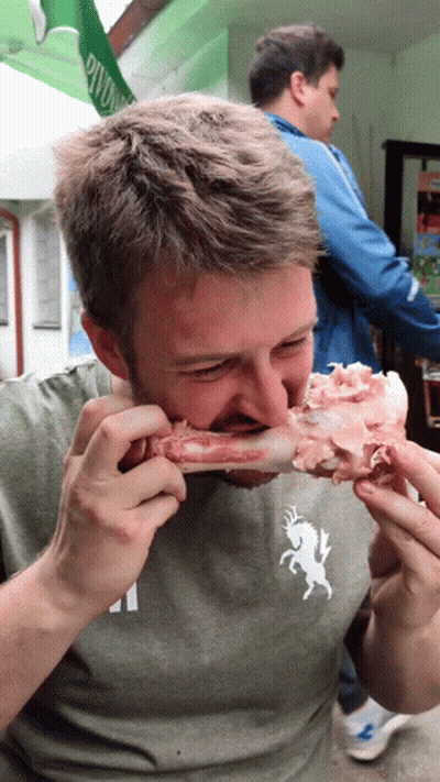 Man Eating Meat With Deer Shirt GIF