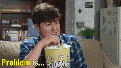 Man Eating Popcorn Saying Problem GIF