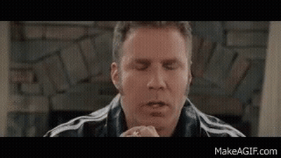 Man Eating Sandwich By Fireplace GIF