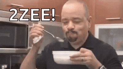 Man Eating Soup From Bowl With Spoon