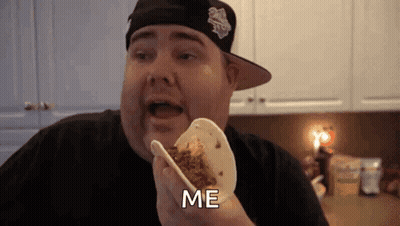 Man Eating Taco Saying Me GIF