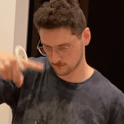 Man Enjoying Spinner In His Finger GIF
