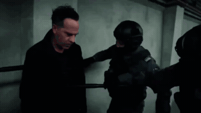 Man Escorted By Police Officer GIF