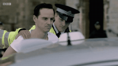 Man Escorted By Police Officer With BBC Logo GIF