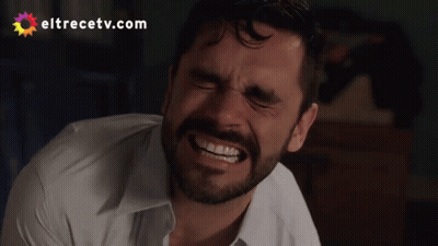 Man Face Close Up With Eltrecetv.com Background GIF