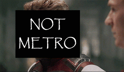 Man Face Obscured By Sign Reading Not Metro GIF
