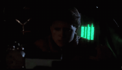 Man Face With Clock Behind GIF