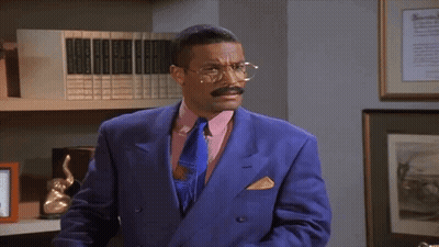 Man Fishing In Boat With Cat Saying We Got Bigger Fry To Fish GIF