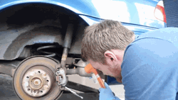 Man Fixing Bmw Car