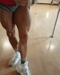 Man Flexing Muscle Growth In His Legs