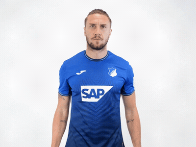 Man Flexing Muscles In Blue Shirt Saying Sap GIF