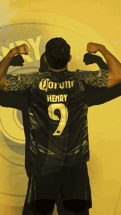 Man Flexing Muscles In Front Of Henry Sign GIF