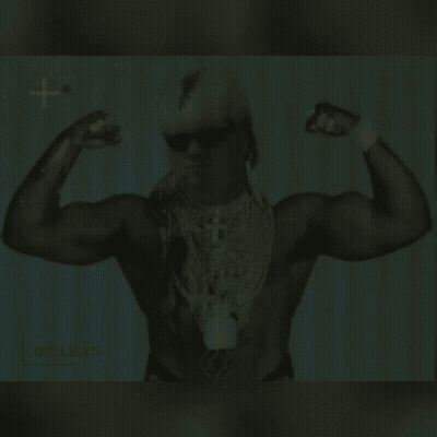 Man Flexing Muscles With Jewelry And Sunglasses GIF