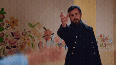 Man Flipping Off Flower Wall GIF