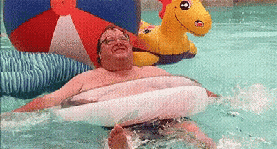 Man Floating In Pool On Raft GIF