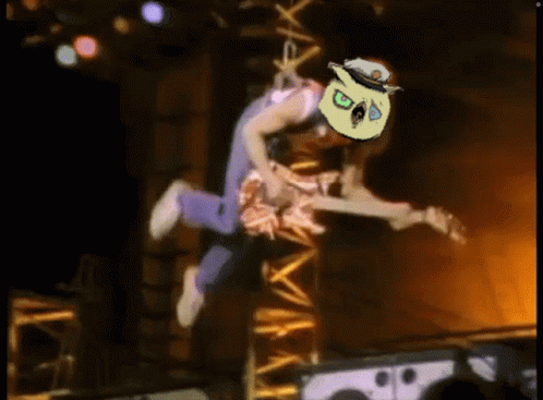 Man Flying Through Air Holding Guitar GIF